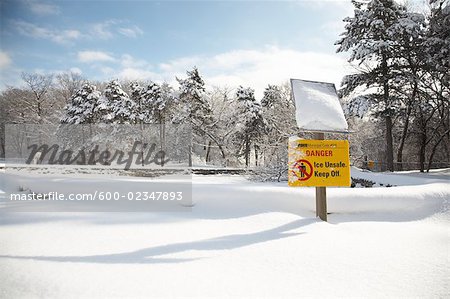 Danger Unsafe Ice Sign in Park, Toronto, Ontario, Canada