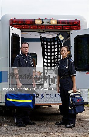 Portrait of Paramedics with Ambulance, Toronto, Ontario, Canada