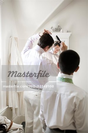 Father and Son Getting Ready for a Wedding