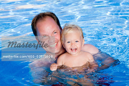 Father and Baby in Swimming Pool