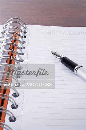 Close-up of Pen and Day Planner