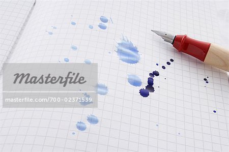 Leaking Pen Leaving Ink Spots on Paper