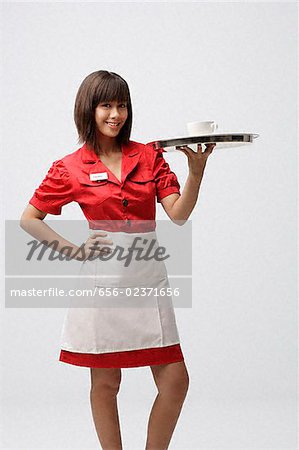 Waitress serving coffee