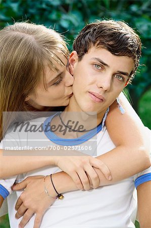 Teenage Girl Kissing Boy