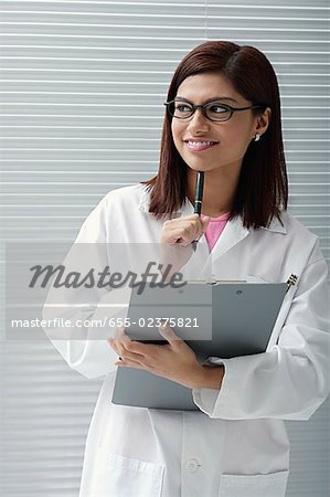 Doctor or scientist with report