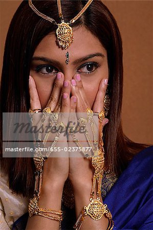 Indian woman wearing traditional wedding jewelry