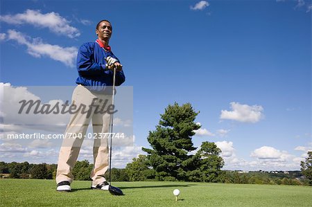 Portrait of Golfer With Driver, Standing Near Tee