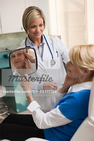 Patient in Doctor's Office, Examining Skin