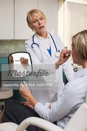 Doctor Explaining Procedure to Patient