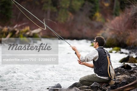 Man Fly Fishing on the Deschutes River, Bend, Oregon, USA