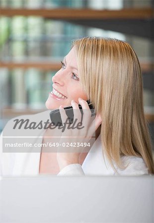 Female on her mobile phone