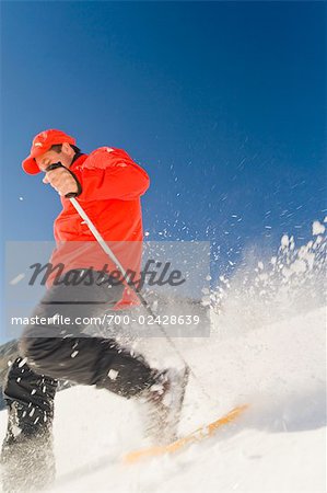 Man Snowshoeing, Salzburger Land, Austria