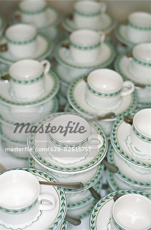 Cups, Bottom Plates and Tea Spoons ready to be served - Order - Festivity