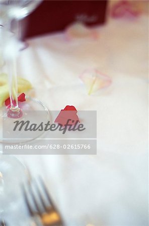 Menu Card on a Table with Rose Petals on it - Decoration - Party - Wedding