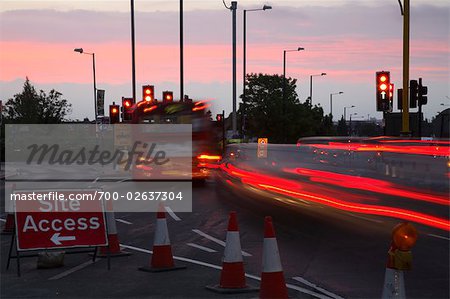 Blurred Lights of Bus Approaching Intersection