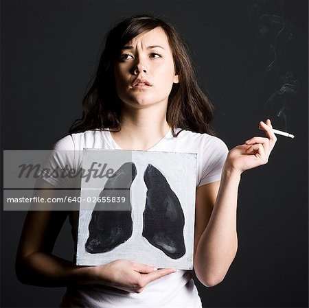 woman smoking with black lungs