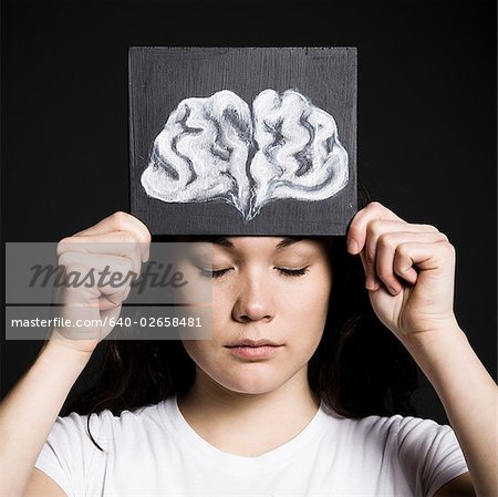 Woman with a drawing of a brain