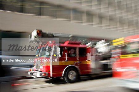 Fire Truck Rushing in City Street, Toronto, Ontario, Canada