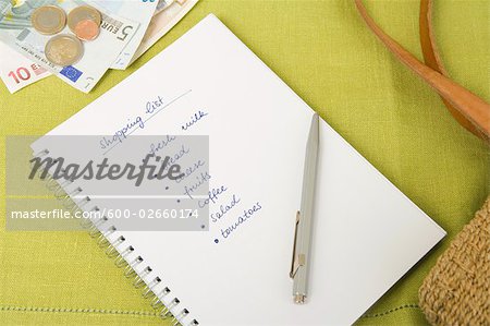 Close-up of Money and Shopping List, Dusseldorf, North Rhine-Westphalia, Germany