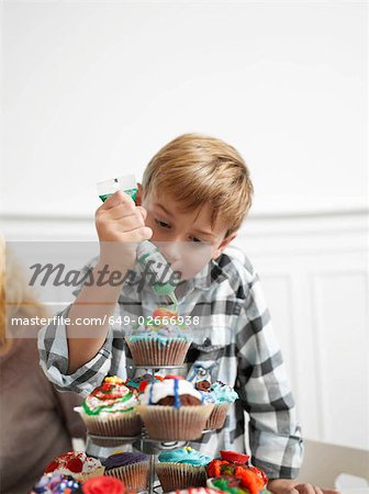 Boy making Cupcakes
