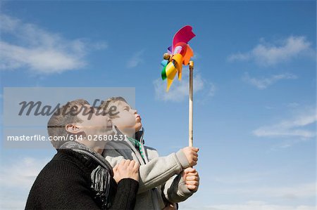 Father and son with pinwheel