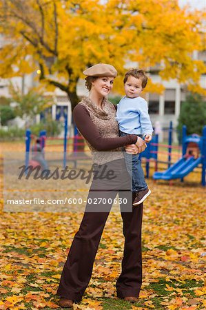 Portrait of Mother and Son in the Park in Autumn, Portland, Oregon, USA