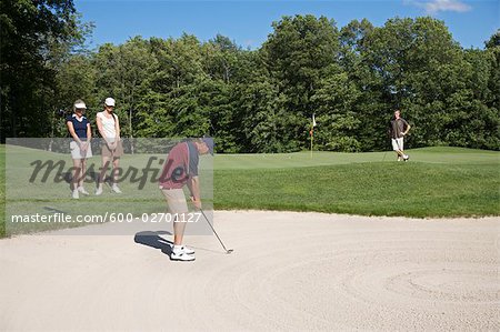 Man in Sand Trap, Burlington, Ontario, Canada