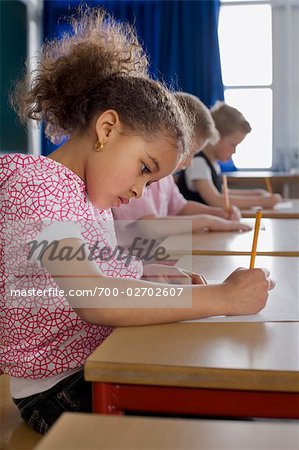 Students Writing Test in School