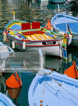 Brightly coloured wooden boats in the harbour, Nice, Alpes Maritimes, Provence, France, Europe