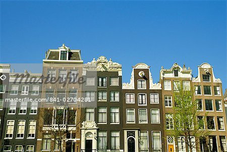 Old merchant houses on the canal in Amsterdam, Holland, The Netherlands