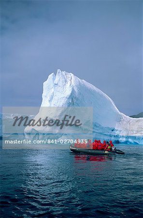 Tourists exploring icebergs by dinghy, Antarctica, Polar Regions