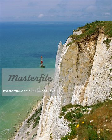 Lighthouse and chalk cliffs at Beachy Head, near Eastbourne, East Sussex, England, UK