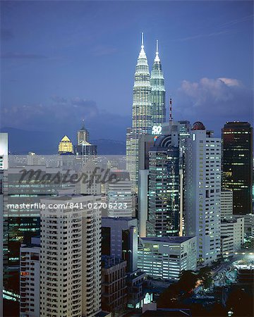 City skyline in the evening, with the twin towers of the Petronas Building, Kuala Lumpur, Malaysia, Asia