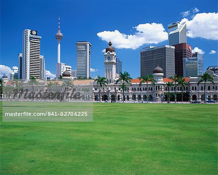 The city skyline from Merdeka Square with the Sultan Abdul Samad Building and Petronas Towers in the centre of Kuala Lumpur, Malaysia, Southeast Asia, Asia