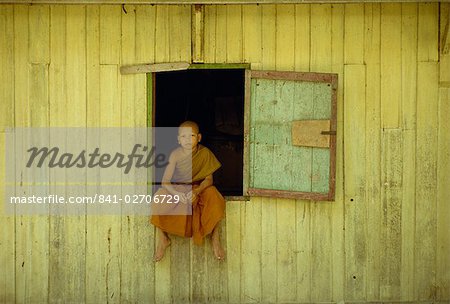 Portrait of a young monk at Wat Phawtpo in Chiang Mai, Thailand, Southeast Asia, Asia