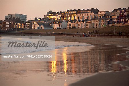 Dusk light on the beach at Portrush, County Antrim, Ulster, Northern Ireland, United Kingdom, Europe