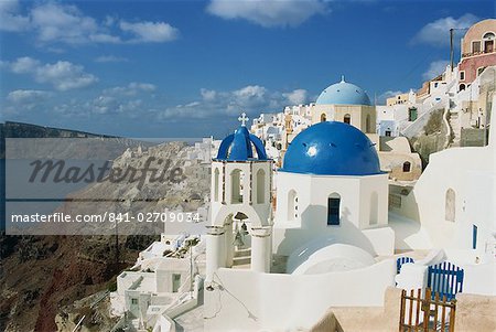 View over the blue domes and white houses of the village of Oia, Santorini (Thira), Cyclades Islands, Greek Islands, Greece, Europe