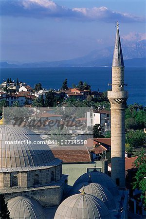 Elevated view of town with dome and minaret of mosque in foreground, Antalya, Lycia, Anatolia, Turkey, Asia Minor, Asia
