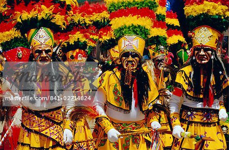 A group of Tobas performing the Devil Dance - La Diablada, during the carnival, Oruro, Bolivia, South America