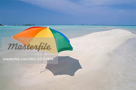 Umbrella and sandbar, North Male Atoll, Maldives, Indian Ocean, Asia