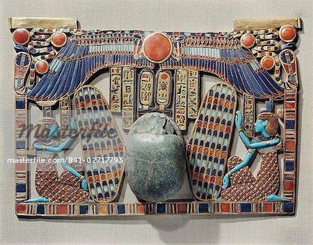 Pectoral decorated with winged scarab, protected by the goddesses Isis and Nephthys, made from gold cloisonne with glass-paste, from the tomb of the pharaoh Tutankhamun, discovered in the Valley of the Kings, Thebes, Egypt, North Africa, Africa