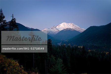 Mt. Rainier at dawn, autumn color in the lower valley, and White River in distance, Washington State, United States of America, North America