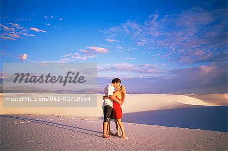 Couple kissing, White Sands National Monument, New Mexico, United States of America, North America