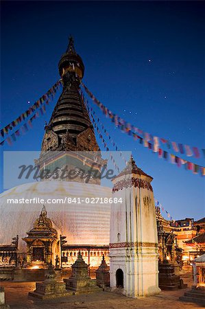 Swayambhunath (Swayambhu) (Monkey Temple) Buddhist stupa on a hill overlooking Kathmandu, taken at dawn with Orion in the sky behind the prayer flags, Kathmandu, UNESCO World Heritage Site, Nepal, Asia