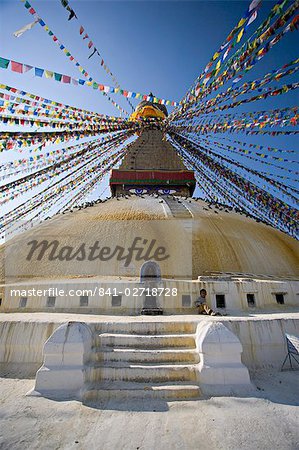 Stupa bouddhiste appelée Boudha à youmir, Katmandou, Népal. Prise à Lhosar, le nouvel an tibétain, d'où l'abondance de la prière de nouveaux indicateurs.