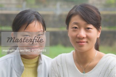 Portrait of two young Chinese women, Huangshan City (Tunxi), Anhui Province, China, Asia