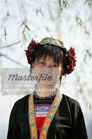 Young woman of Yao Minority mountain tribe, with traditional costume, Li River, Yangshuo, Guangxi Province, China, Asia