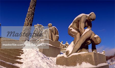 Snow covered statue in winter, Frogner Park (Vigeland's Park), Oslo, Norway, Scandinavia, Europe
