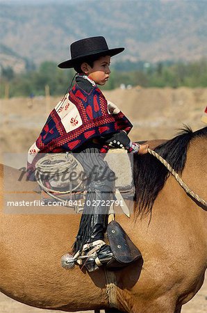Young rider at the Fiesta de Cuasimodo, a traditional festival one week after Easter, La Barnechea, in Santiago, Chile, South America