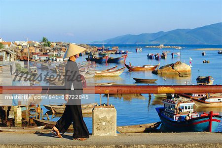 Woman on Xom Bong Bridge, Nha Trang, Vietnam, Asia Woman on Xom Bong Bridge, Nha Trang, Vietnam, Asia